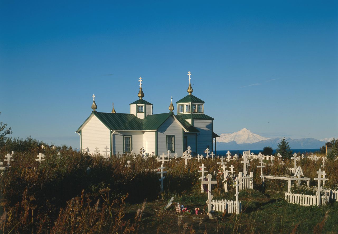 Orthodox Church of the Transfiguration, Ninilchik, Kenai Peninsula, Alaska. In the distance is Redoubt Volcano on the other side of Cook Inlet.Orthodox Church of the Transfiguration, Ninilchik, Kenai Peninsula, Alaska,